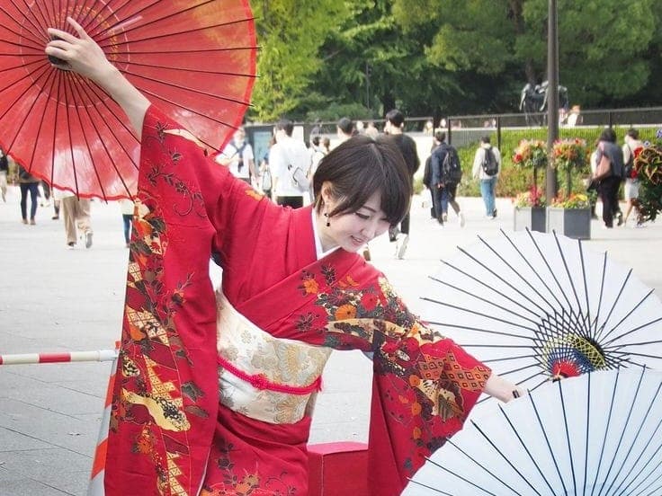 Parasol dancer in red