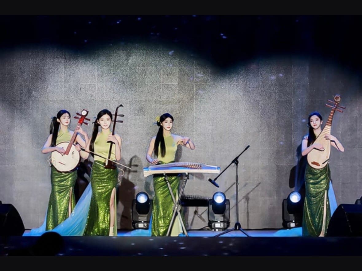 Music Ensemble artists in green costume