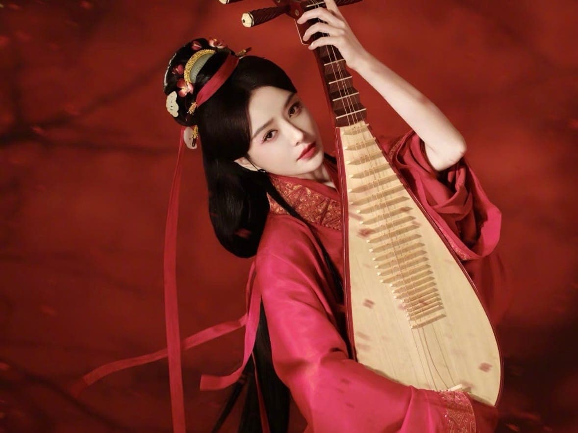 Pipa artist in red dress